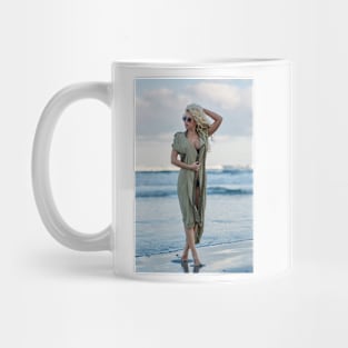 Beautiful woman on the sea shore Mug